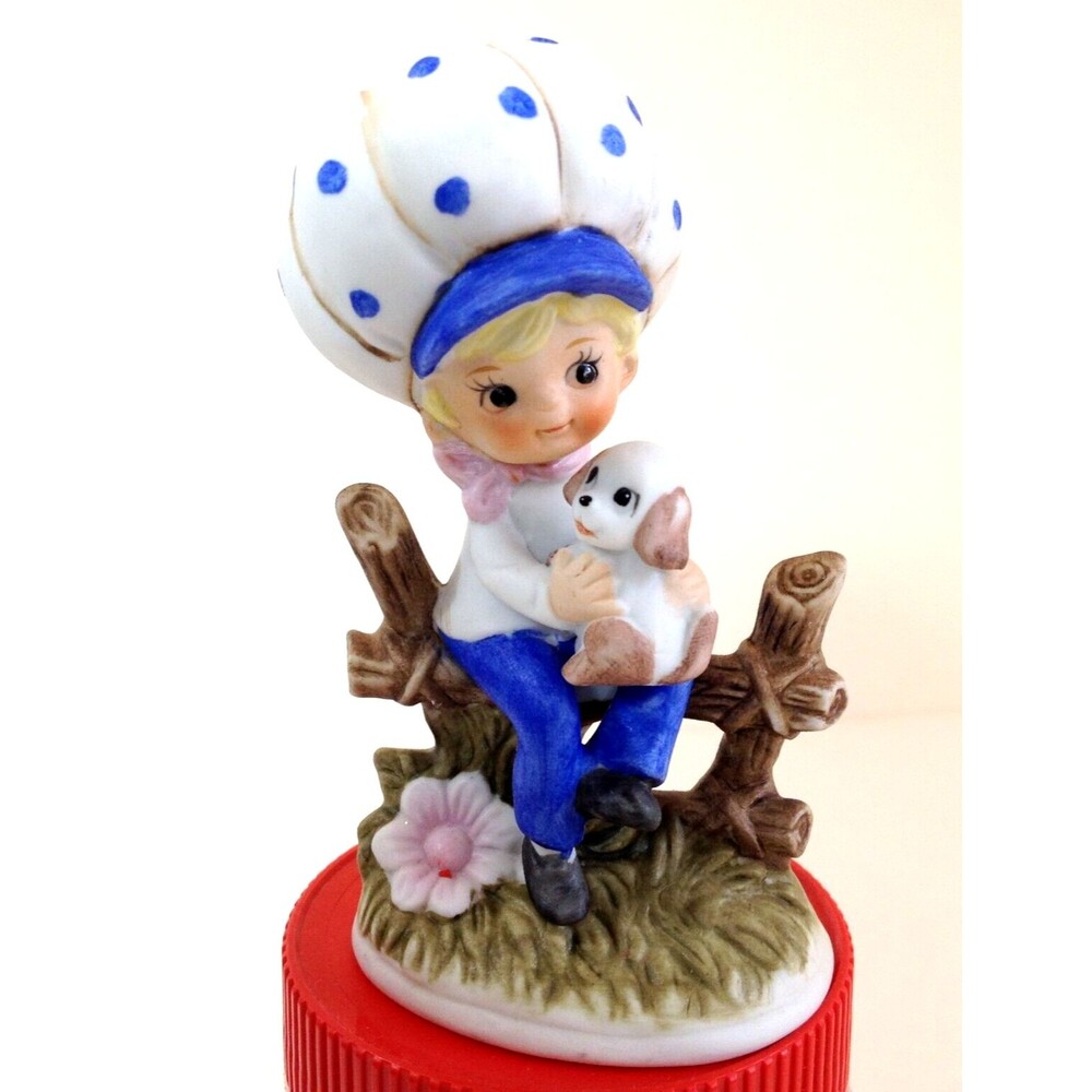 Kelvin Child on Fence Rail with Puppy Porcelain Knick knack